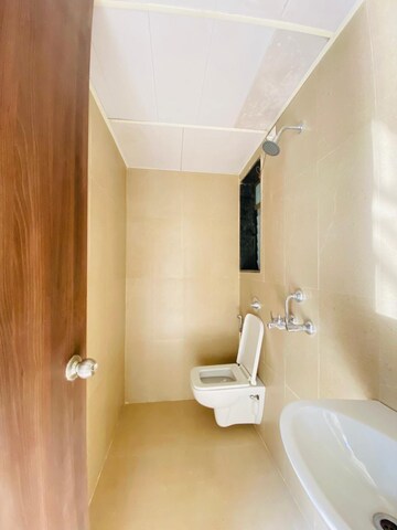 Bathroom in 1.5 BHK Apartment at Runwal My City Phase II Cluster 05, Dombivli East – for Rent
