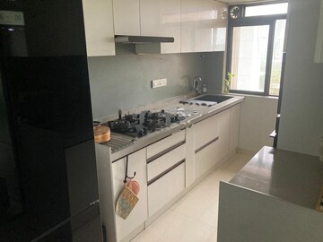 Kitchen in 2 BHK Apartment at Kanakia Rainforest, Andheri East – for Rent