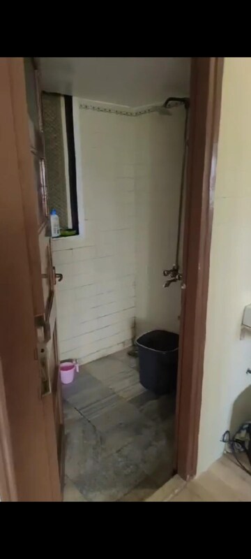 Bathroom in 2 BHK Apartment at Ashirwad CHS Andheri West, Versova – for Rent