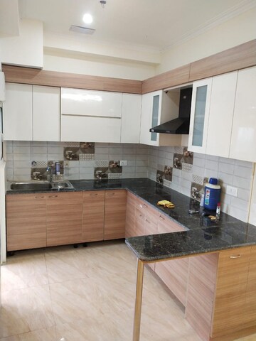Kitchen in 1 RK Apartment at Purvanchal Royal City, Chi V Greater Noida – for Rent