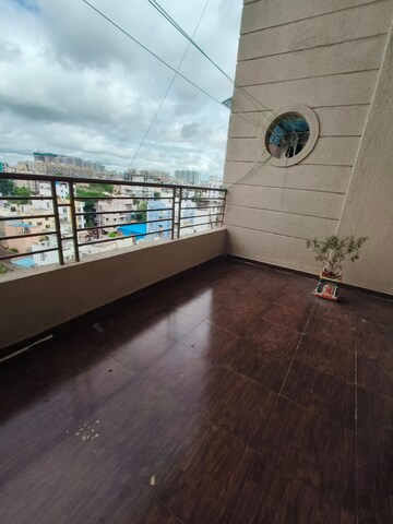 Balcony in 2 BHK Apartment at Satyam Serenity, Wadgaon Sheri – for Rent
