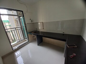 Kitchen in 2 BHK Apartment at Ashar Metro Towers, Vartak Nagar – for Sale