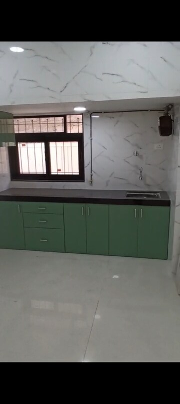 Kitchen in 1 BHK Apartment at Devika Towers, Collectors Colony – for Rent