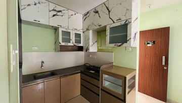 Kitchen in 1 BHK Apartment at Rohan Ipsita, Hinjewadi – for Rent