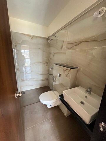 Bathroom in 2 BHK Apartment at Mantra Monarch, Balewadi – for Rent