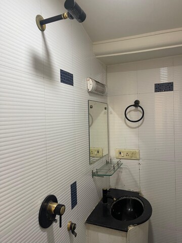 Bathroom in 1 BHK Apartment at Sun N Sea, Andheri West – for Rent