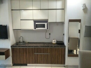 Kitchen in 1 RK Apartment at Supertech North Eye, Sector 74 – for Rent