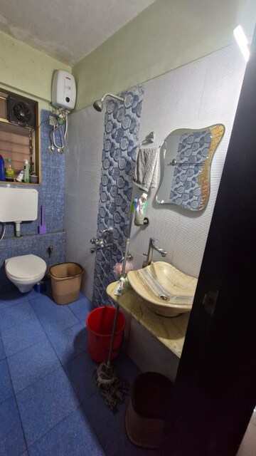 Bathroom in 2 BHK Apartment at Runwal Garden City, Balkum Pada – for Sale