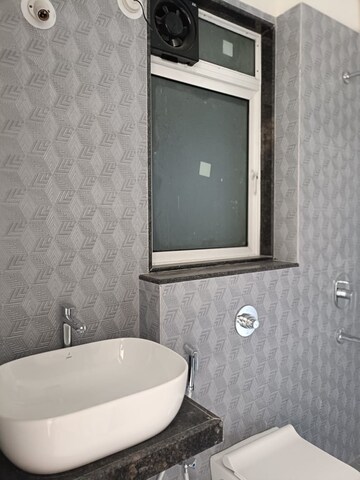 Bathroom in 1 BHK Apartment at Ashar Axis, Majiwada – for Rent