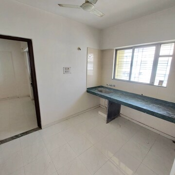 Kitchen in 1 BHK Apartment at Karan Rhea, Wadegaon – for Rent