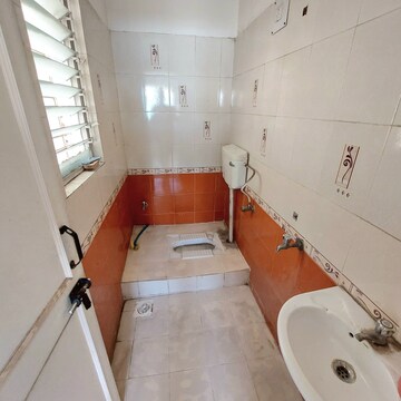 Bathroom in 1 BHK Apartment at Karan Rhea, Wadegaon – for Rent