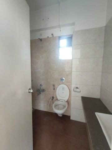 Bathroom in 4 BHK Penthouse at HN Safal Orchid Harmony, Shela – for Rent