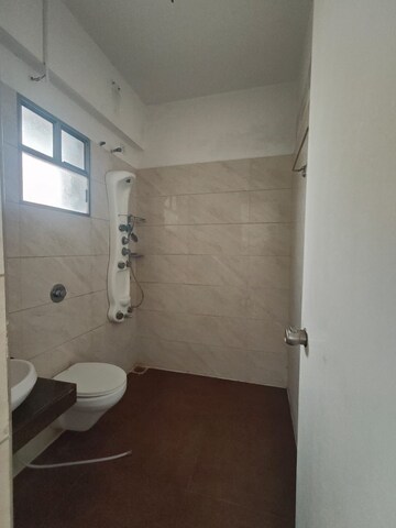 Bathroom in 4 BHK Penthouse at HN Safal Orchid Harmony, Shela – for Rent