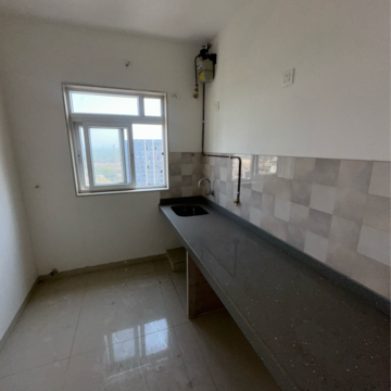 Kitchen in 2 BHK Apartment at Haware IPSA, Naidu Colony – for Rent