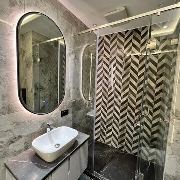 Bathroom in 4 BHK Apartment at DLF The Belvedere Park, Sector 24 – for Rent