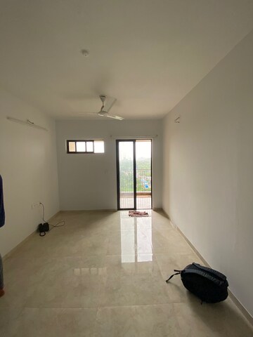 Living Room in 1.5 BHK Apartment at Lodha Palava City Lakeshore Greens, Dombivli East – for Rent
