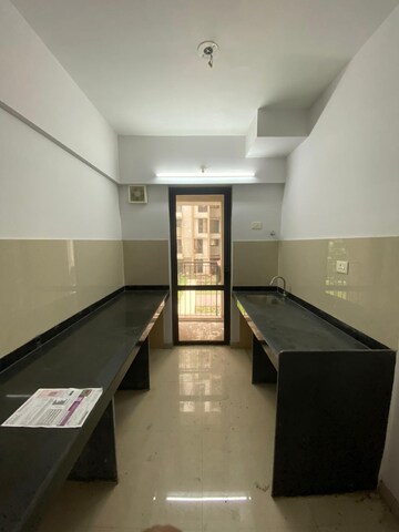 Kitchen in 1.5 BHK Apartment at Lodha Palava City Lakeshore Greens, Dombivli East – for Rent