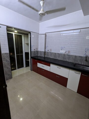 Kitchen in 1 BHK Apartment at Kanch Pada – for Rent