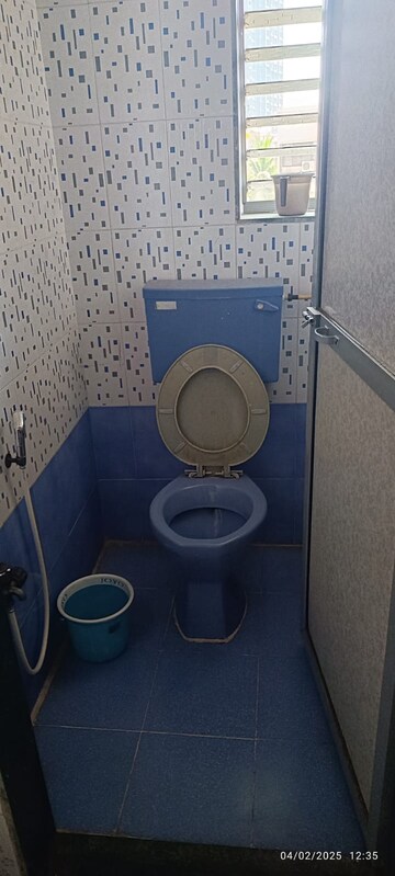 Bathroom in 1 BHK Apartment at Rajendra Vihar CHS, Malad West – for Rent