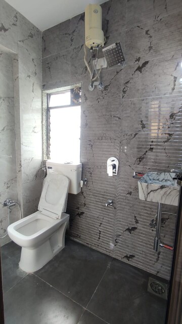 Bathroom in 1 BHK Apartment at Guru Krupa CHS Malad, Malad West – for Rent