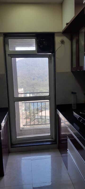 Kitchen in 1 BHK Apartment at JP North Atria, Mira Road – for Sale