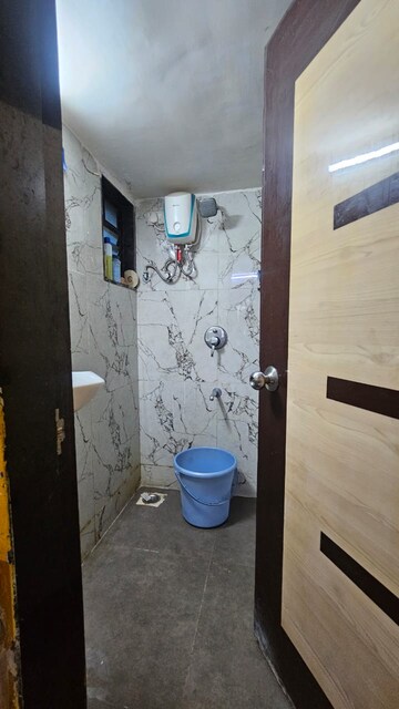Bathroom in 1.5 BHK Apartment at RNA NG Canary, Mira Road – for Rent