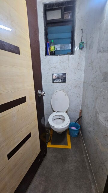 Bathroom in 1.5 BHK Apartment at RNA NG Canary, Mira Road – for Rent