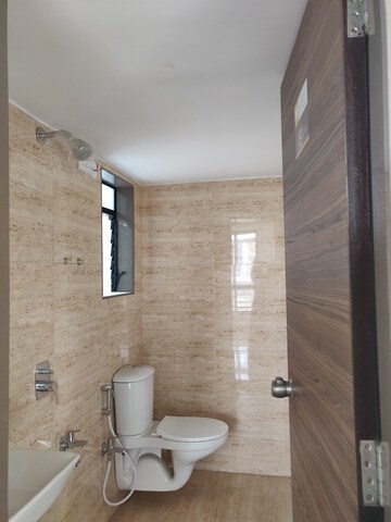 Bathroom in 1 BHK Apartment at Happy Sarvoday Greens, Bhadwad Gaon – for Sale