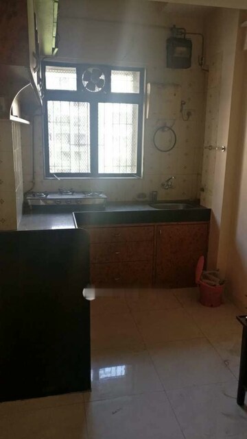 Bathroom in 1 BHK Apartment at Tara Gagan CHS, Tilak Nagar – for Rent