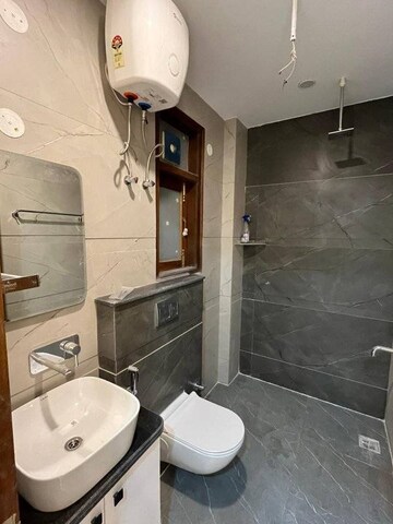 Bathroom in 3.5 BHK Apartment at Ambience Creacions, Sector 22 – for Rent