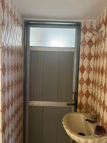 Bathroom in 2 BHK Apartment at Dombivli East – for Rent