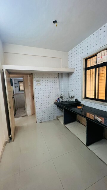 Kitchen in 1 BHK Apartment at Dombivli West – for Sale