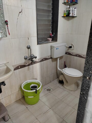 Bathroom in 1 BHK Apartment at KVC Mahesh Tower, Kandivali West – for Sale