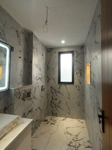 Bathroom in 4 BHK Builder Floor at Infinite Luxury, South City 2 – for Sale