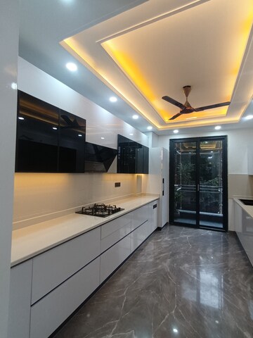Kitchen in 4 BHK Builder Floor at Infinite Luxury, South City 2 – for Sale