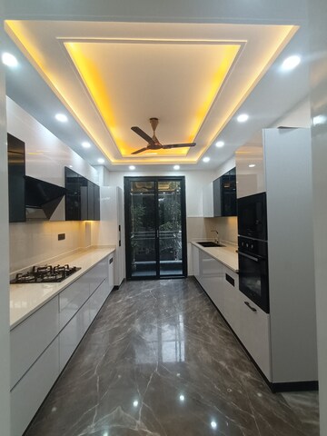 Kitchen in 4 BHK Builder Floor at Infinite Luxury, South City 2 – for Sale
