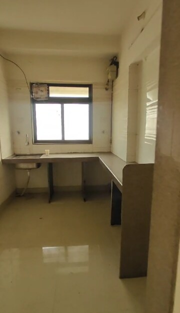 Kitchen in 2 BHK Apartment at Bhatia Dahisar Sumati CHS, Dahisar West – for Rent