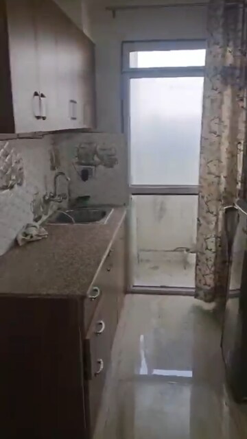 Kitchen in 1 RK Apartment at Tata Primanti-Tower Residences, Sector 72 – for Rent