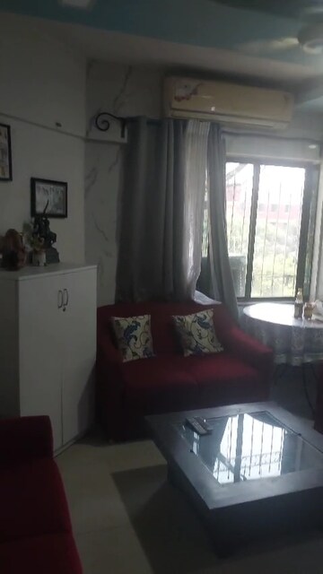 Living Room in 1 BHK Apartment at Avillion Greenfields Co Op Housing Society, Jogeshwari East – for Rent