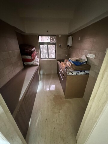 Kitchen in 2 BHK Apartment at Godrej Nest Kandivali, Kandivali East – for Rent