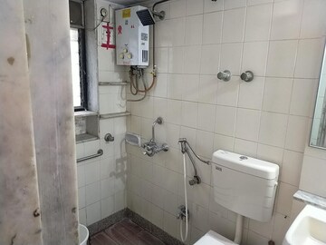 Bathroom in 2 BHK Apartment at Kanakia Sanskruti CHS, Kandivali East – for Rent