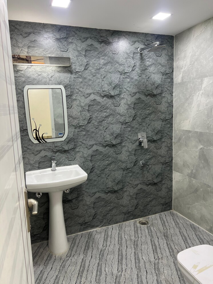 Bathroom, risland-sky-mansion 2 Bedroom 900 Sq.Ft. Apartment In Chattarpur Delhi 8163567