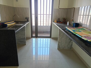 Kitchen in 2 BHK Apartment at Kalpataru Paramount, Kapur Bawdi – for Rent