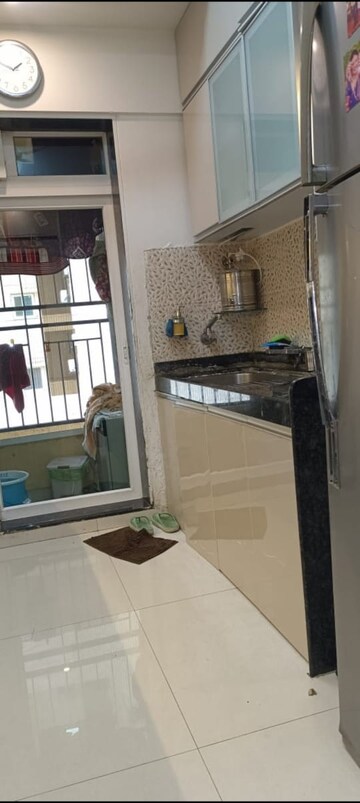 Kitchen in 2 BHK Apartment at Rustomjee Azziano Wing D, Majiwada – for Sale