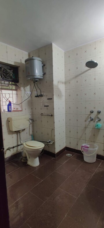 Bathroom in 2 BHK Apartment at Rohini Sector 9 – for Rent