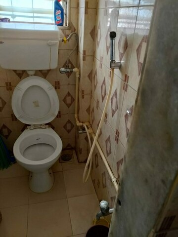 Bathroom in 1 BHK Apartment at Acme Apna Ghar, Goregaon East – for Rent