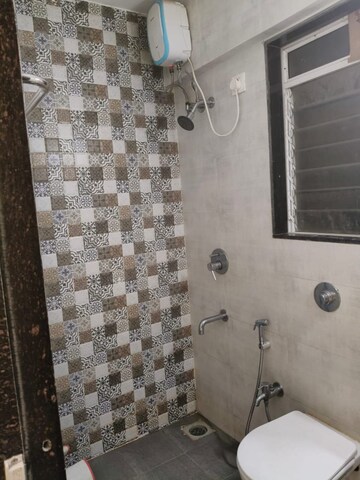 Bathroom in 1 BHK Apartment at Vihang Valley Phase 3, Kasarvadavali – for Sale