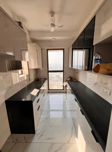 Kitchen in 2 BHK Apartment at Raymond Ten X Habitat, Pokhran Road No 2 – for Rent