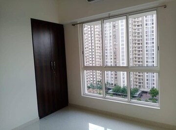 Bedroom in 2 BHK Apartment at Lodha Amara, Kolshet Road – for Rent