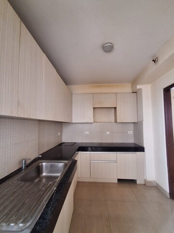 Kitchen in 3 BHK Apartment at Shapoorji Pallonji Joyville Phase 2, Sector 102 – for Sale